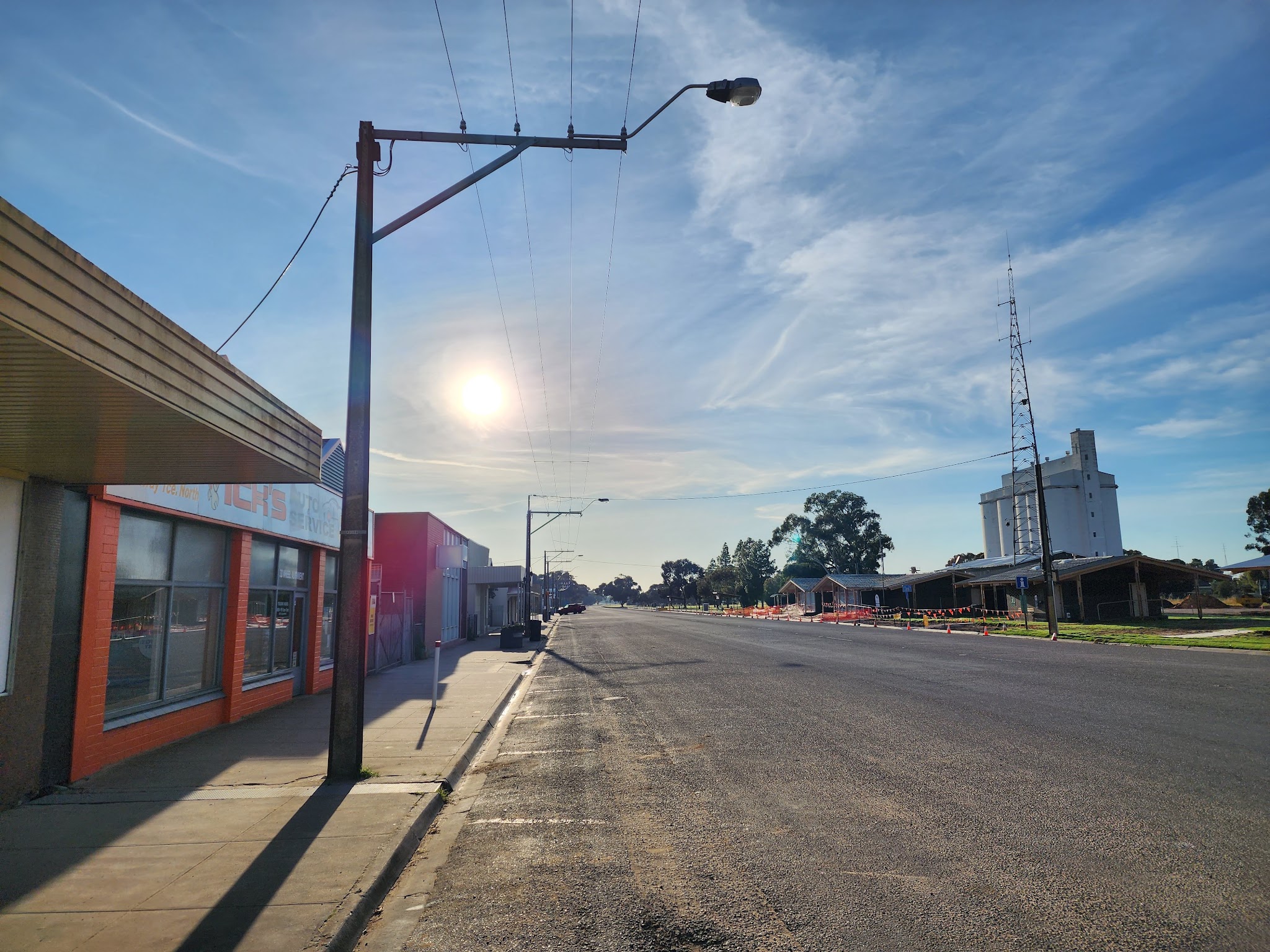 Morning light along the footpath outside the workshop